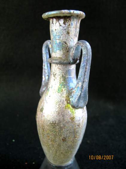  **SOLD** Fantastic iridescense in this lovely Roman glass piece.