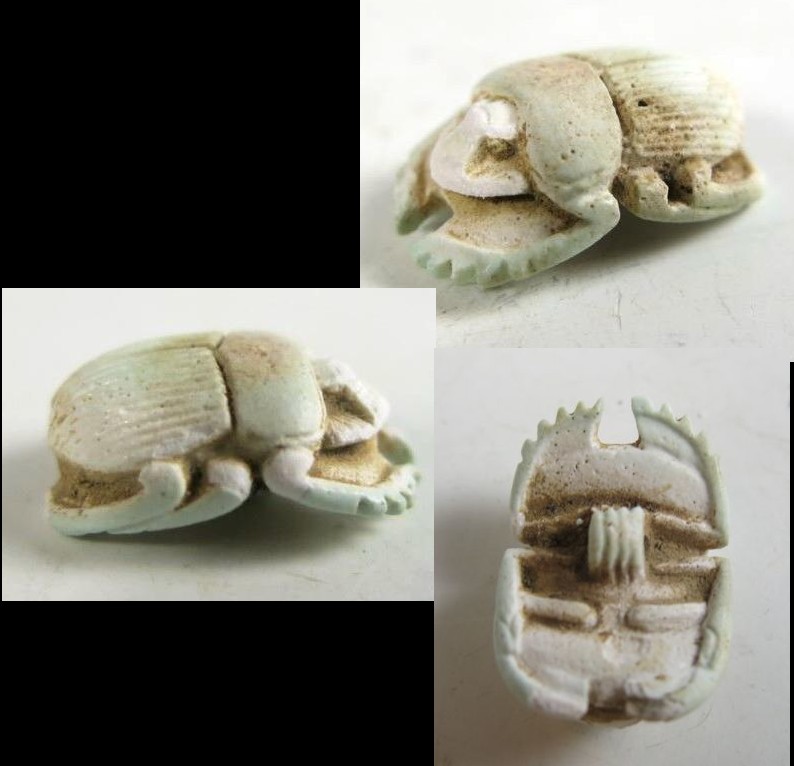 **SOLD** A light blue faience funerary scarab