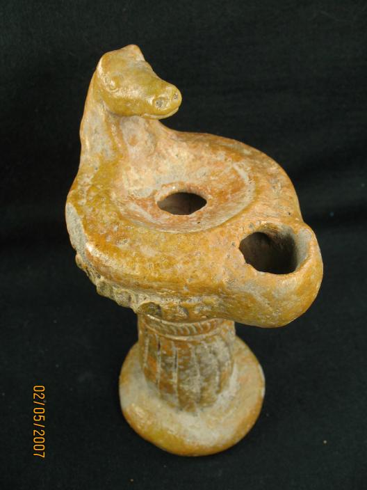 **SOLD** A most unusual glazed Roman pedestal lamp
