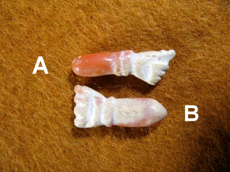  **SOLD** Unusual early coral hand amulets.