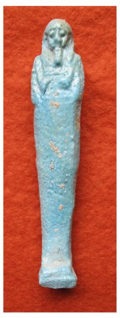 **SOLD** Nice glossy faience ushabti with basket over the shoulder