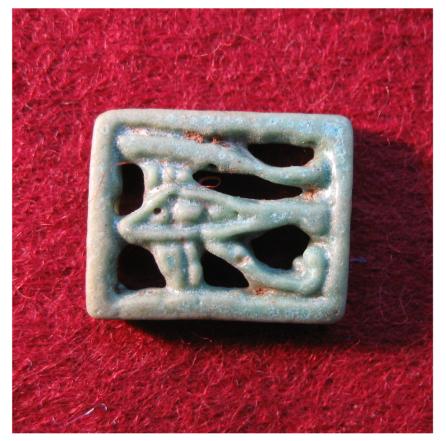 **SOLD** A nice TIP open-work faience Wedjat amulet