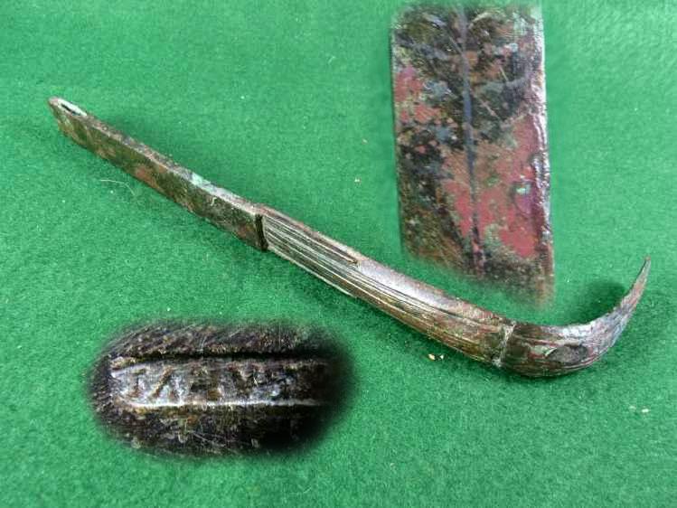 **SOLD** Early Roman decorated bronze strigil with maker's mark