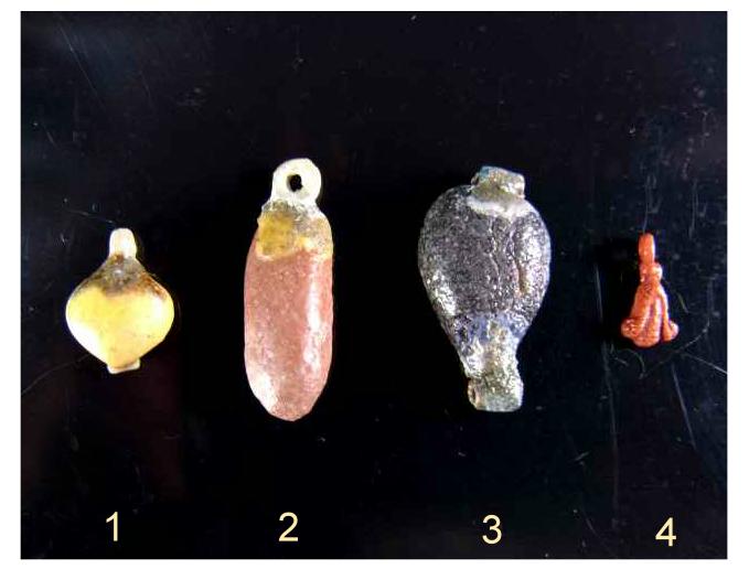 **SOLD** Four rather  good and colourful Amarna faience beads